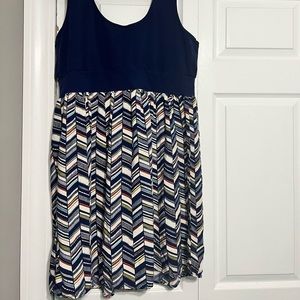 Knee length summer dress. Knit top flowy bottom.
